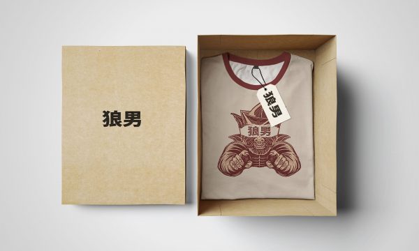 Empty isolated box and white tshirt with label Empty isolated box and white tshirt with label